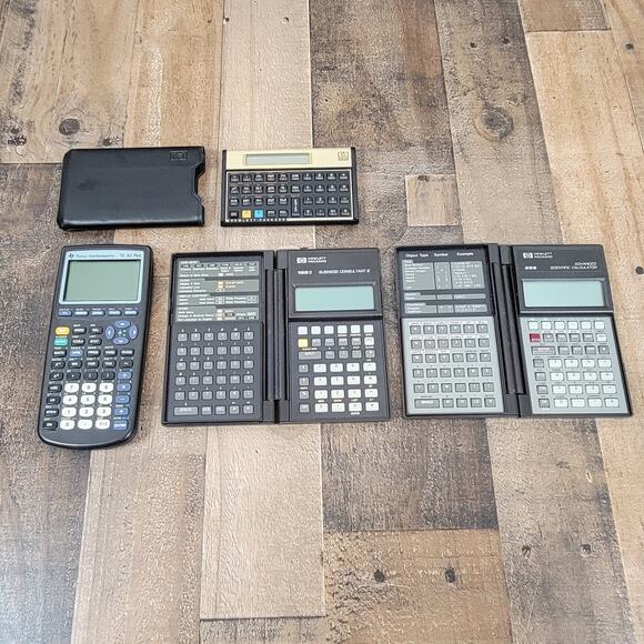 Lot of 4 Calculators HP 19B II, 12C, 28S, Texas Instruments TI-83 Plus For Parts - Picture 1 of 10